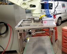 Robot tooling for lifting heavy bales mounted to Kawasaki BX130 robot